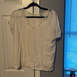 White eyelet V neck top